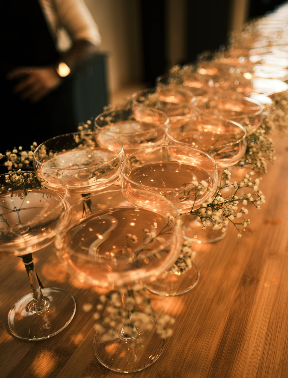 Easy to make Gin Cocktail from Secret Garden Distillery served in coupe glass decorated with baby's breath