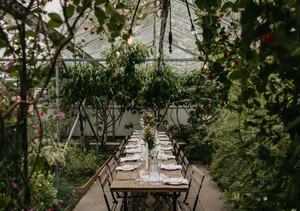 Cafe tables nestled amongst the botanicals used to make Secret Garden Distillerys award winning premium gin