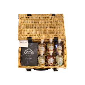 Six Secret Garden Distillery gins in handy taster size as gin miniatures with cocktail booklet in 12 inch wicker basket