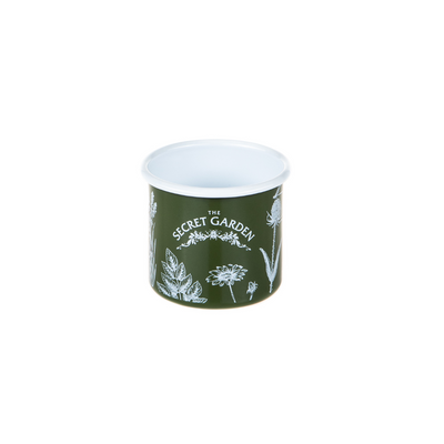 Secret Gardens Enamel mug in green features our old logo