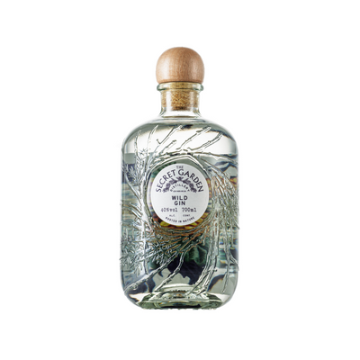 Secret Garden Distillery London Dry Wild Gin with Organic Spirit in the embossed recycled glass bottle with bespoke artwork labels representing key native Scottish botanicals in their luxury premium gins