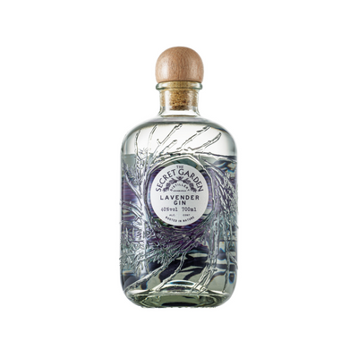 Secret Garden Distillery Lavender Gin in the embossed recycled glass bottle with bespoke artwork labels representing key botanicals in their luxury premium gins